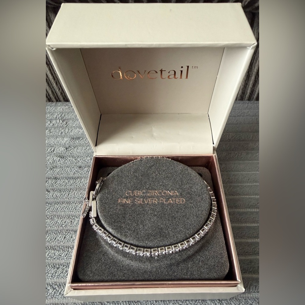 New Dovetail Silver Plated Tennis Bracelet with Faith Cross Cubic Zirconia